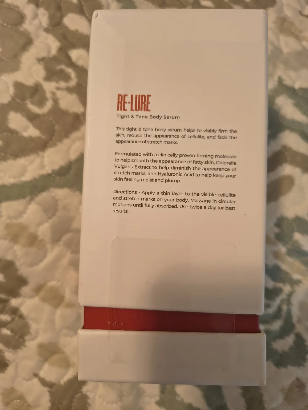 MAËLYS RE-LURE Tight & Tone Body Serum - White with Red Accents